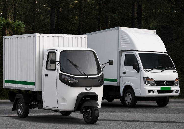 Sleek XEV Electric Commercial Logistics Cargo Van charging at solar dock